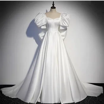Elegantní Dlouhé Ivory Saténové Večerní Šaty S Lukem A-Line Miláček Skládaný Zip Soud Vlak Ples Šaty pro Ženy